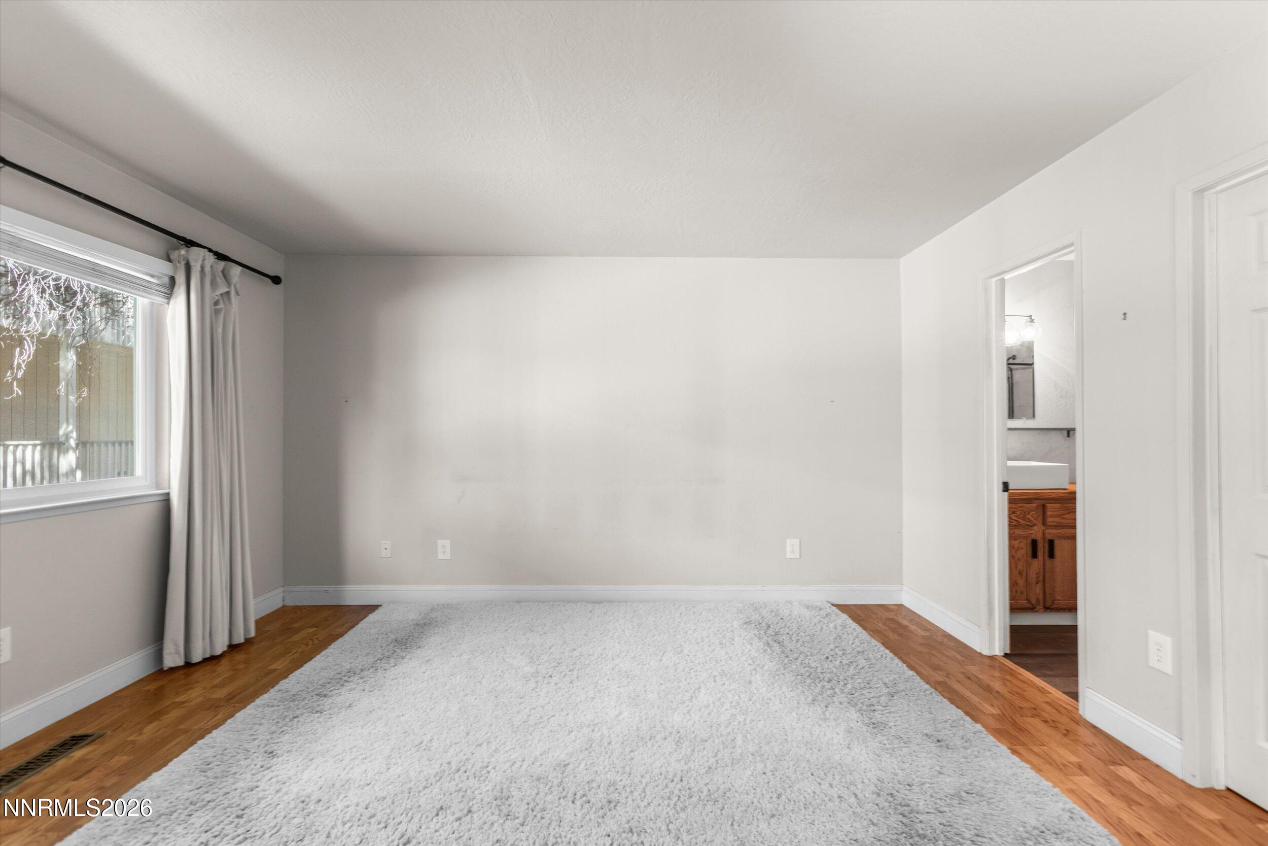 2300 Dickerson Road, Unit 51 Reno, NV 89503 - Photo 14 of 46 an empty room with windows