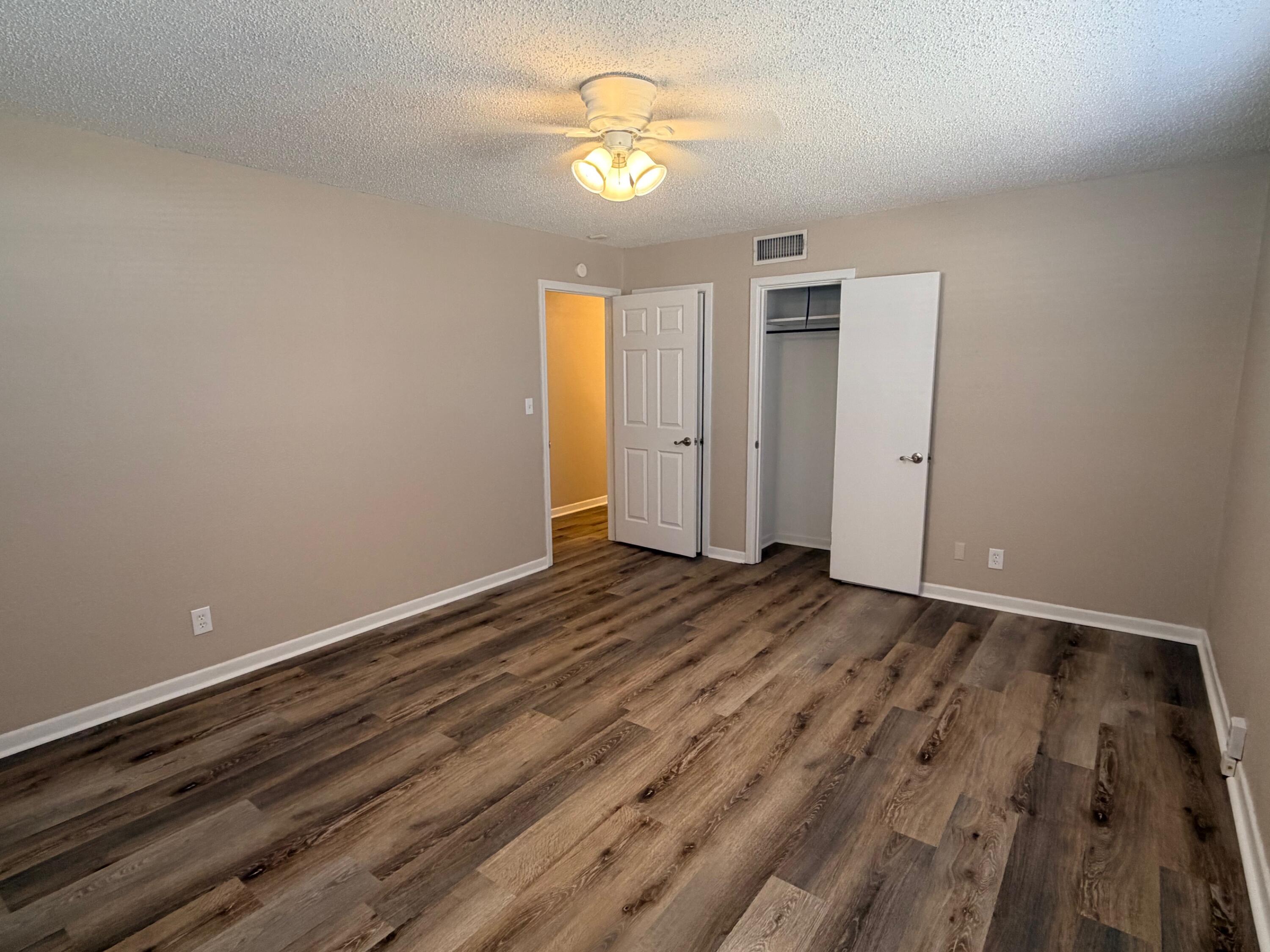 4310 42nd Street Lubbock, TX 79413 - Photo 15 of 25 a view of empty room with wooden floor