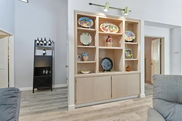 a view of cabinets and window