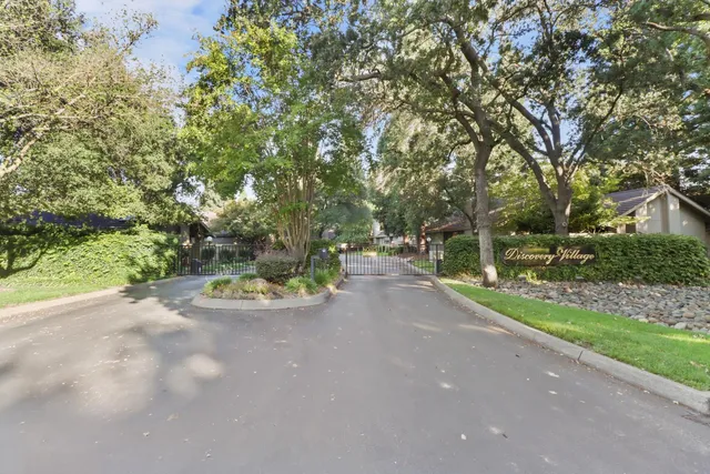 a view of a street with a trees