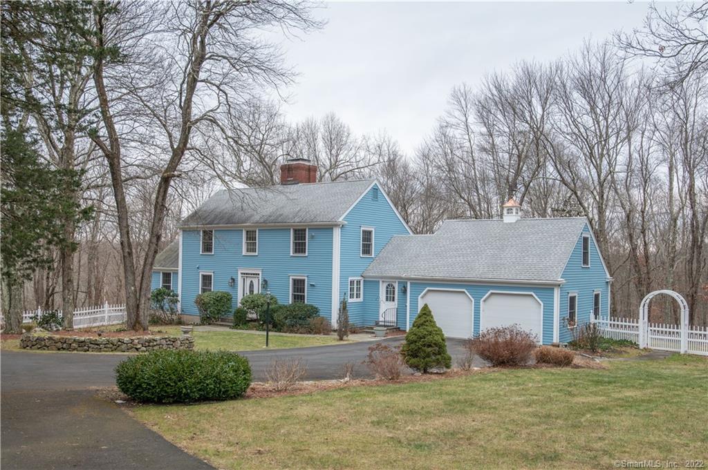 125 Codfish Hill Road Bethel, CT 06801 - Photo 1 of 1 a front view of a house with a yard and garage