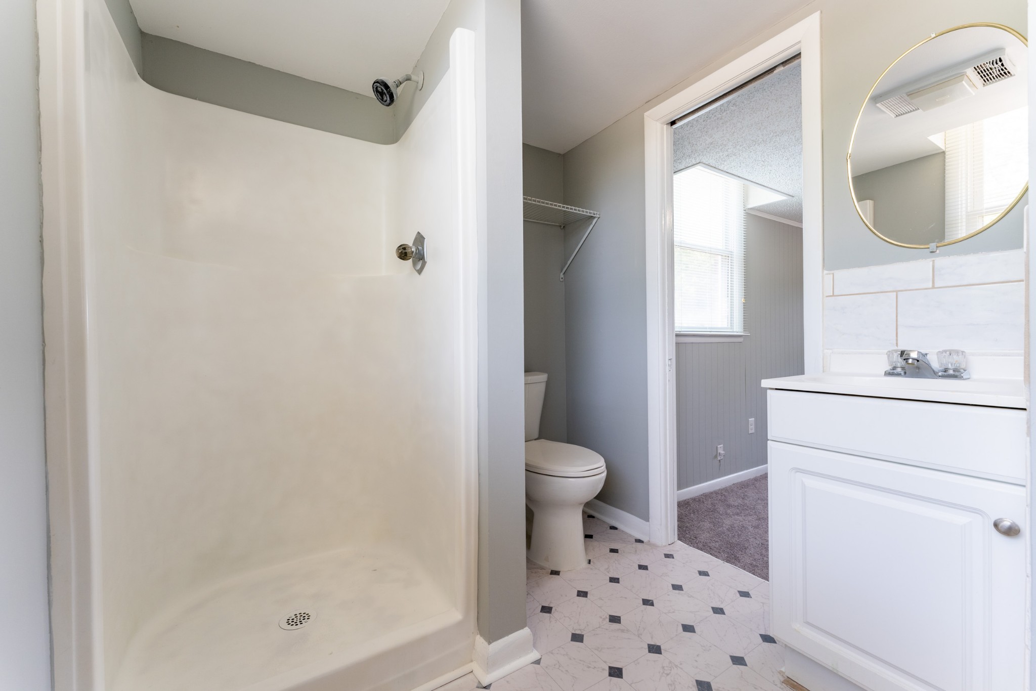 178 Jacksonian Drive Hermitage, TN 37076 - Photo 19 of 38 a bathroom with a shower a toilet and a sink