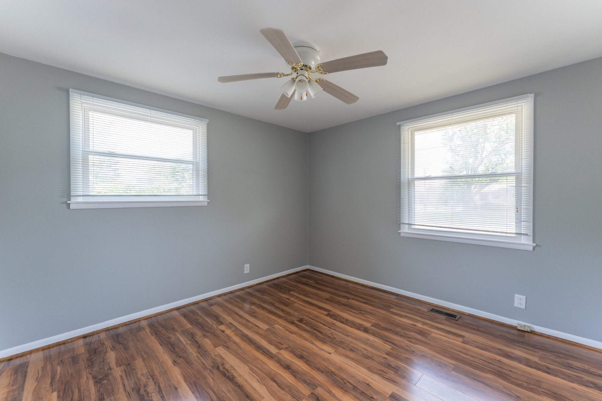 178 Jacksonian Drive Hermitage, TN 37076 - Photo 21 of 38 a view of an empty room with wooden floor and a window