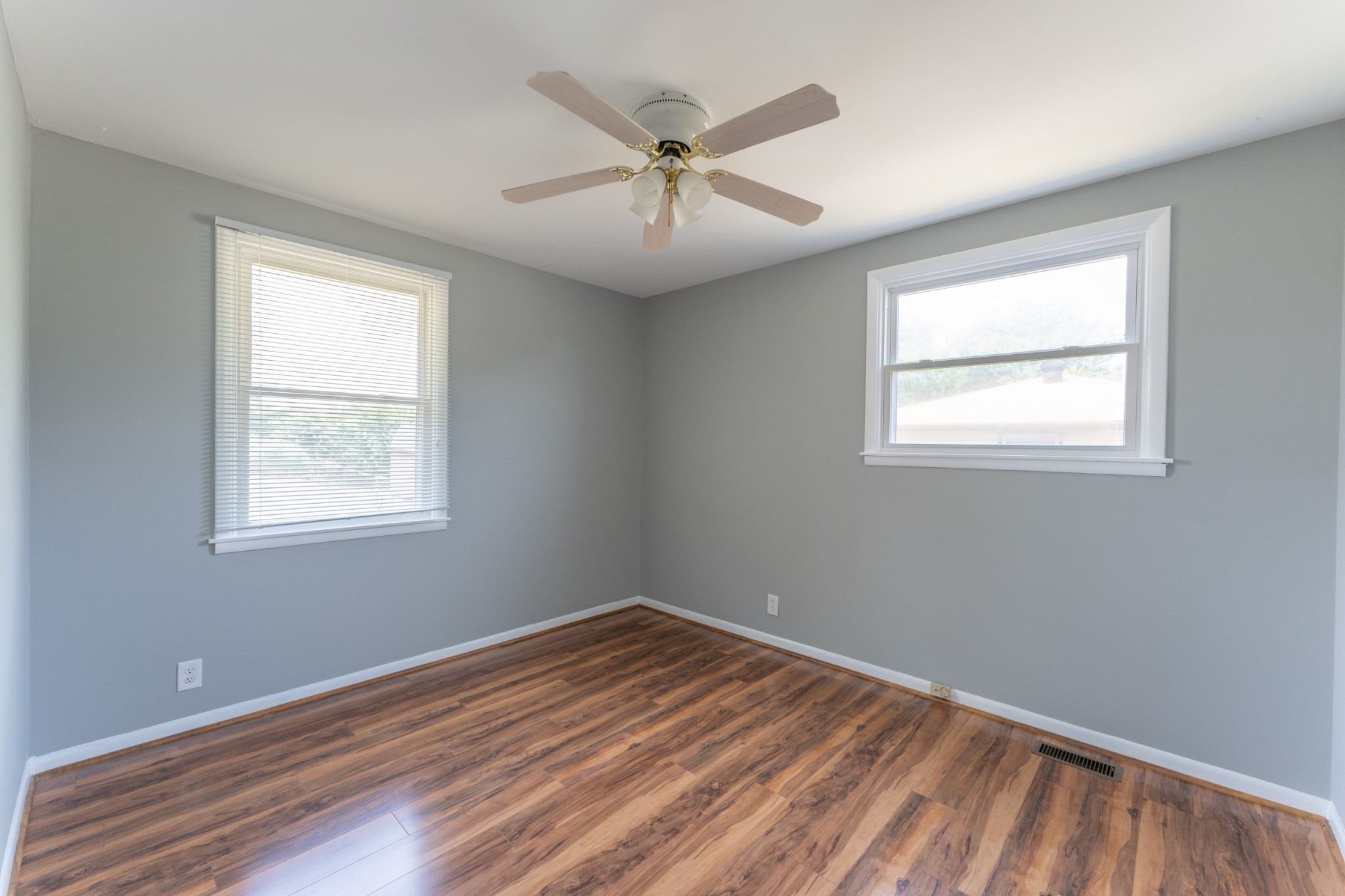 178 Jacksonian Drive Hermitage, TN 37076 - Photo 24 of 38 wooden floor in an empty room with a window