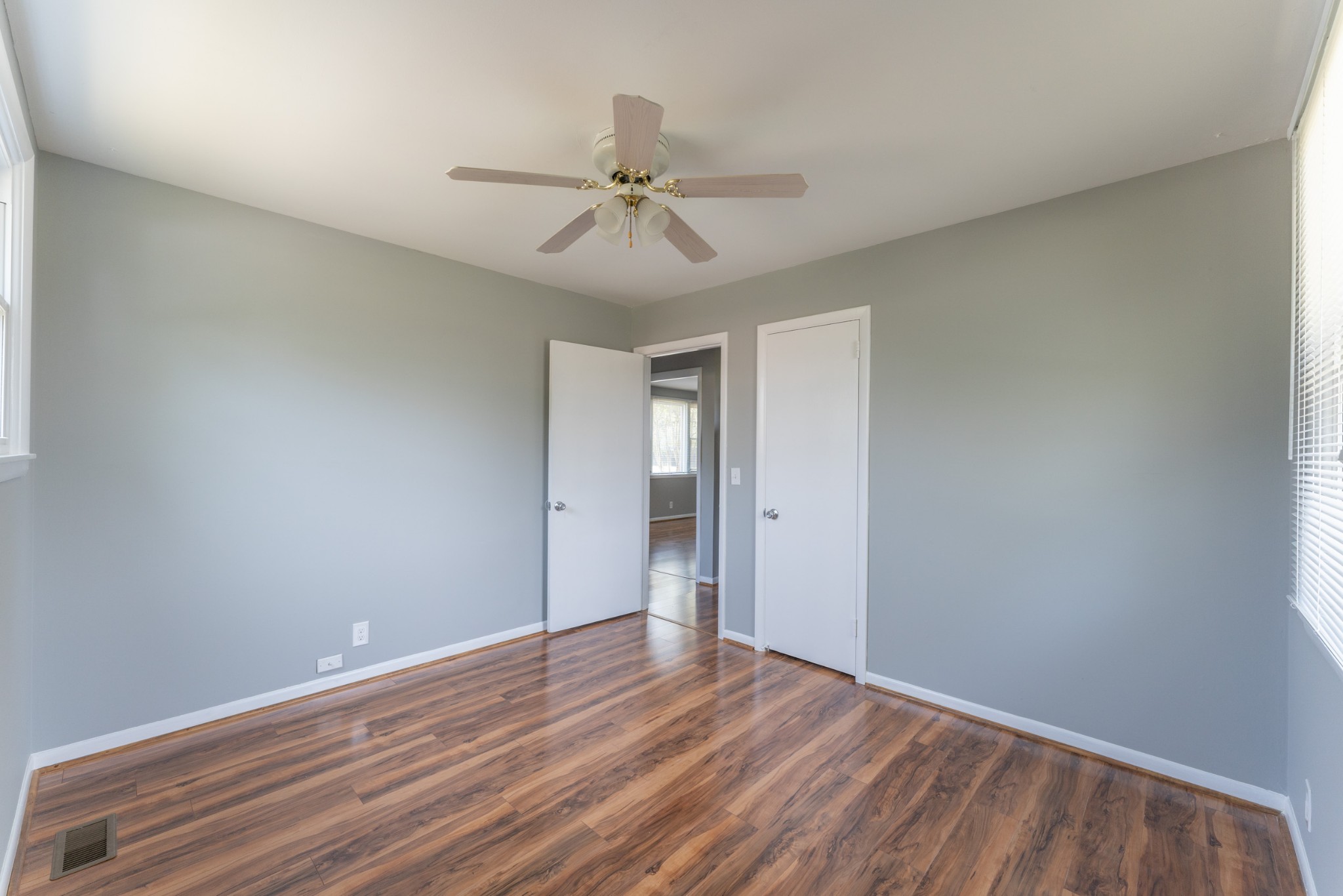 178 Jacksonian Drive Hermitage, TN 37076 - Photo 25 of 38 a view of an empty room with wooden floor and a ceiling fan
