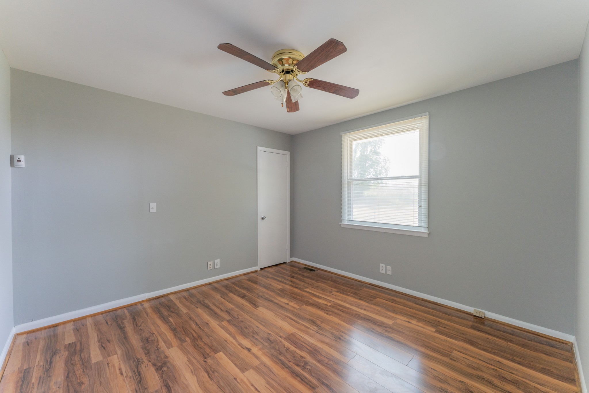 178 Jacksonian Drive Hermitage, TN 37076 - Photo 26 of 38 wooden floor in an empty room with a window
