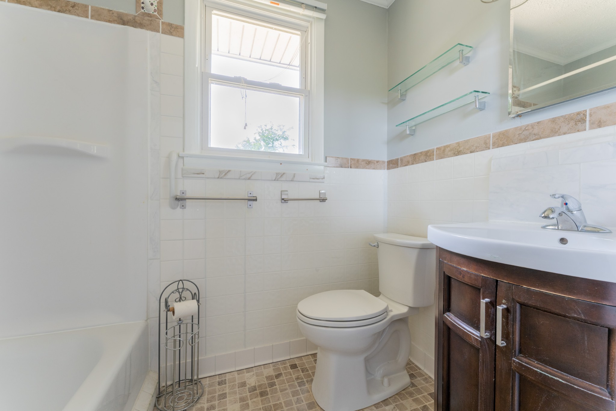 178 Jacksonian Drive Hermitage, TN 37076 - Photo 30 of 38 a bathroom with a sink a toilet and window