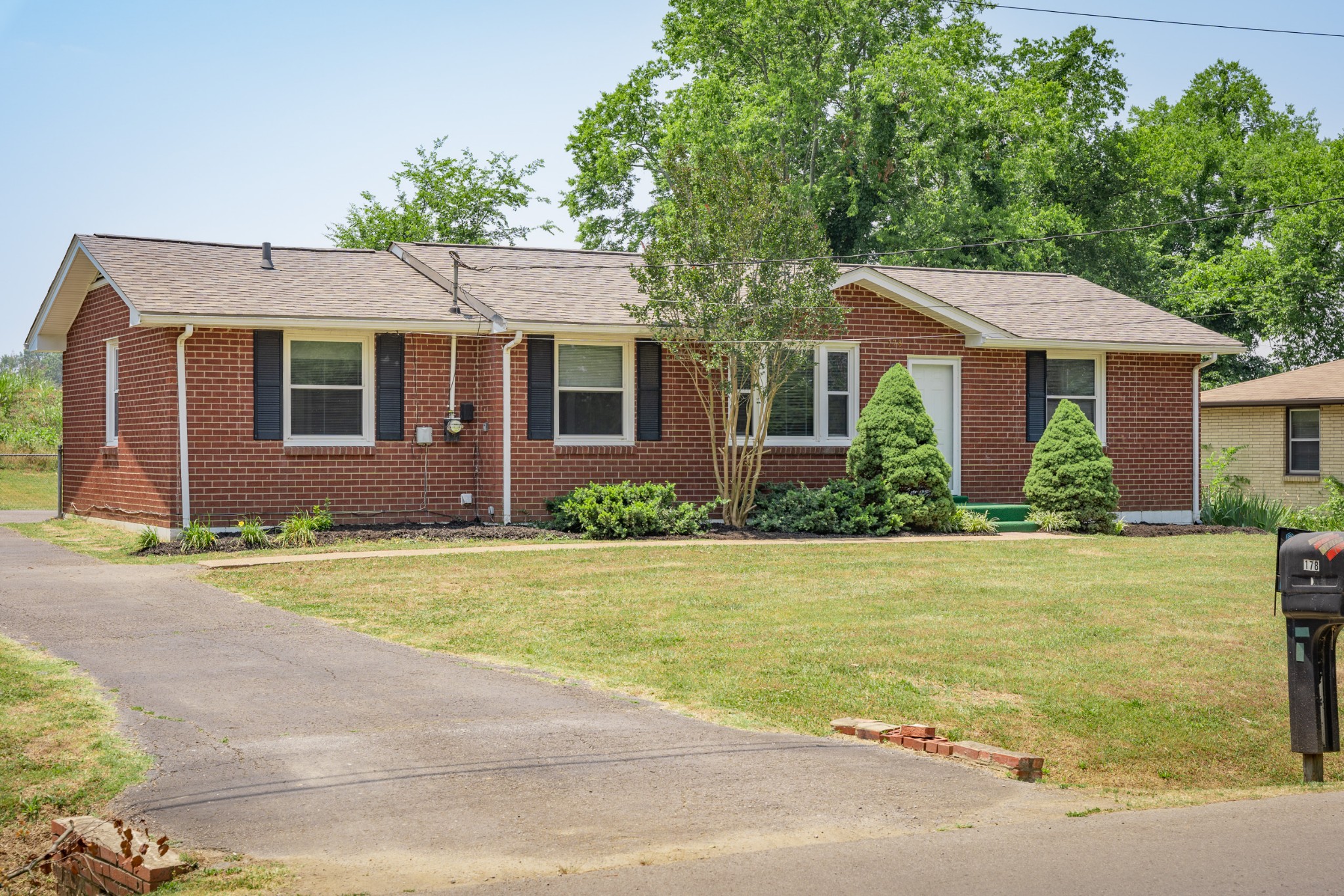 178 Jacksonian Drive Hermitage, TN 37076 - Photo 3 of 38 front view of a house and a yard
