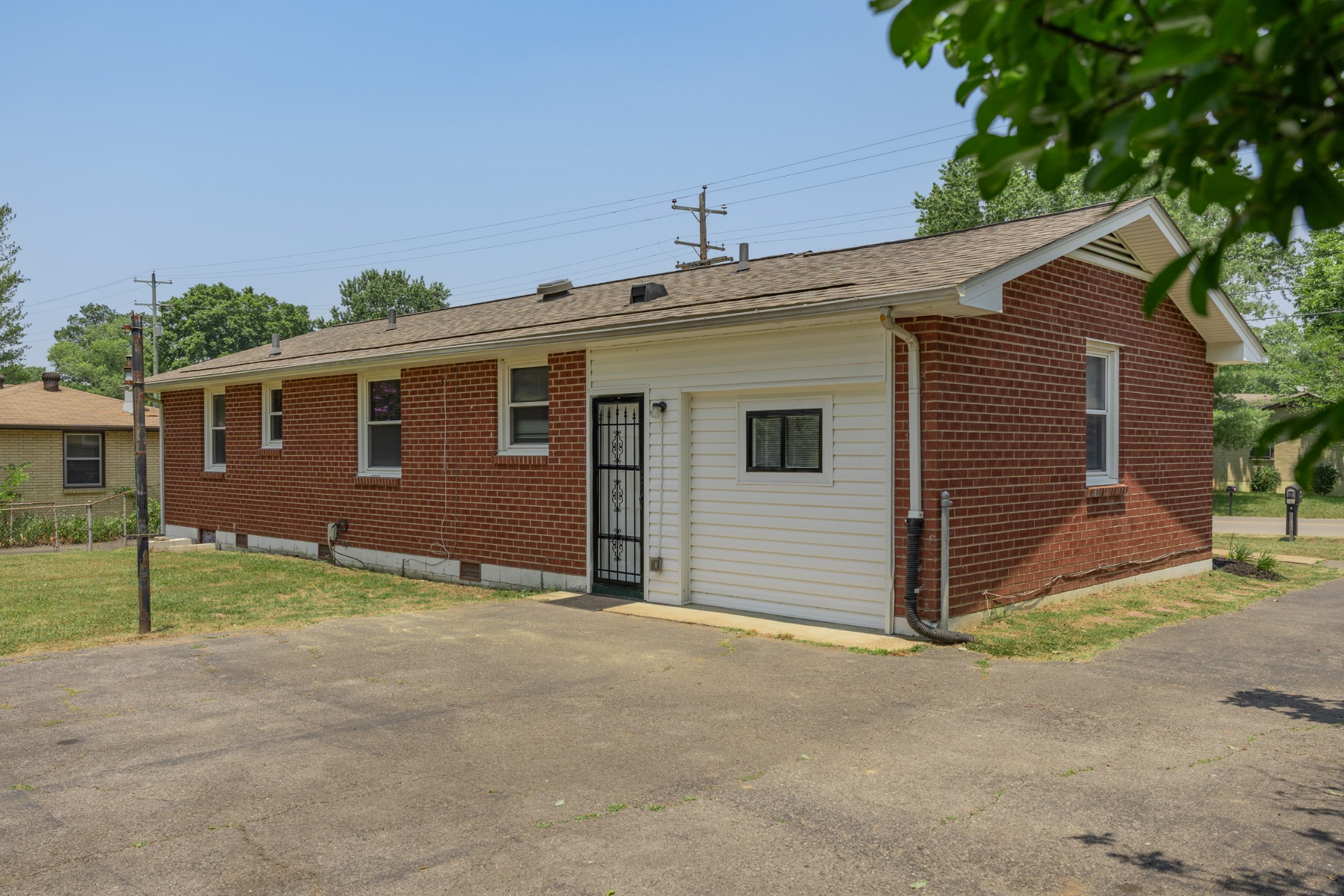 178 Jacksonian Drive Hermitage, TN 37076 - Photo 34 of 38 a view of a house with a yard and garage