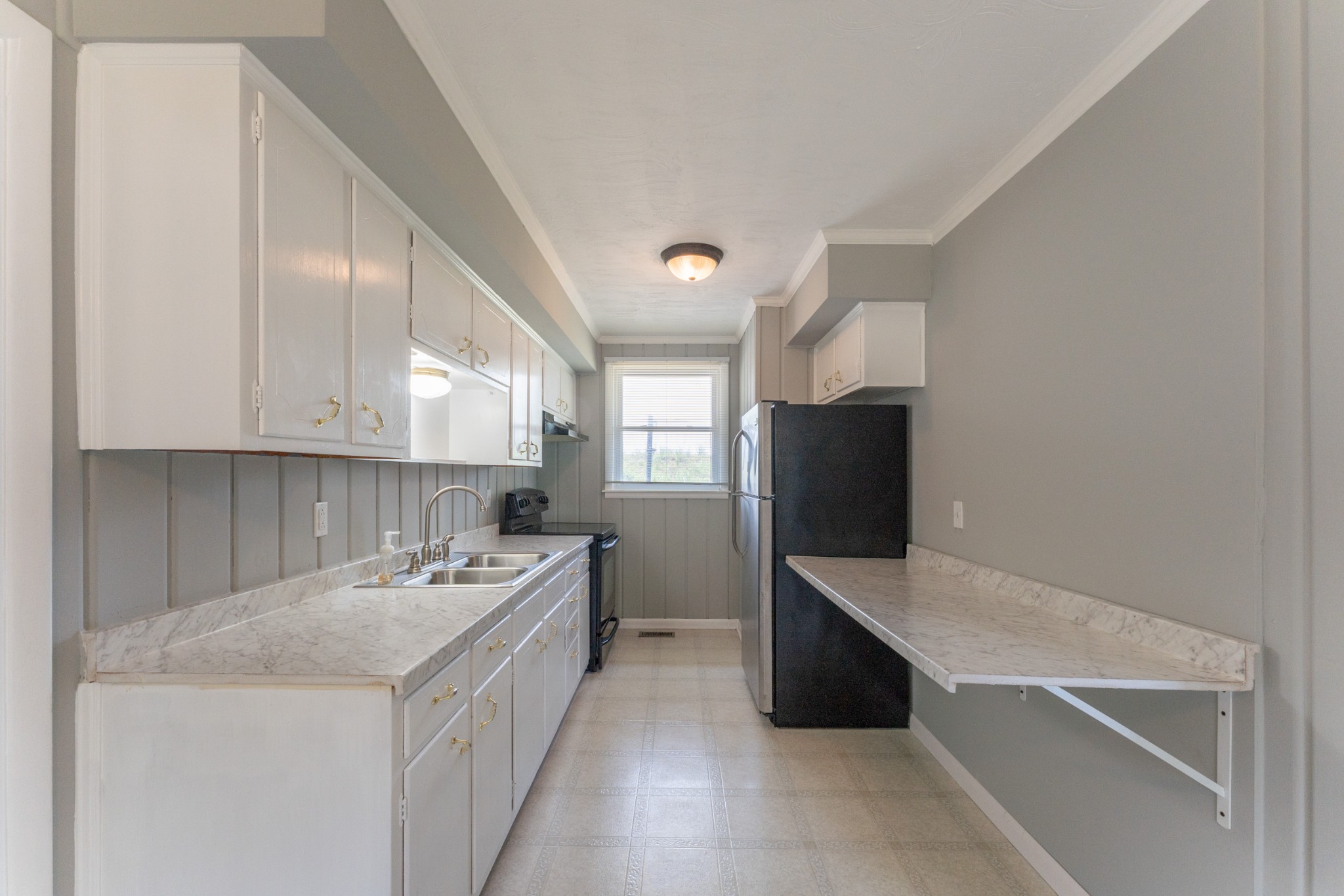 178 Jacksonian Drive Hermitage, TN 37076 - Photo 10 of 38 a kitchen with a sink cabinets and window