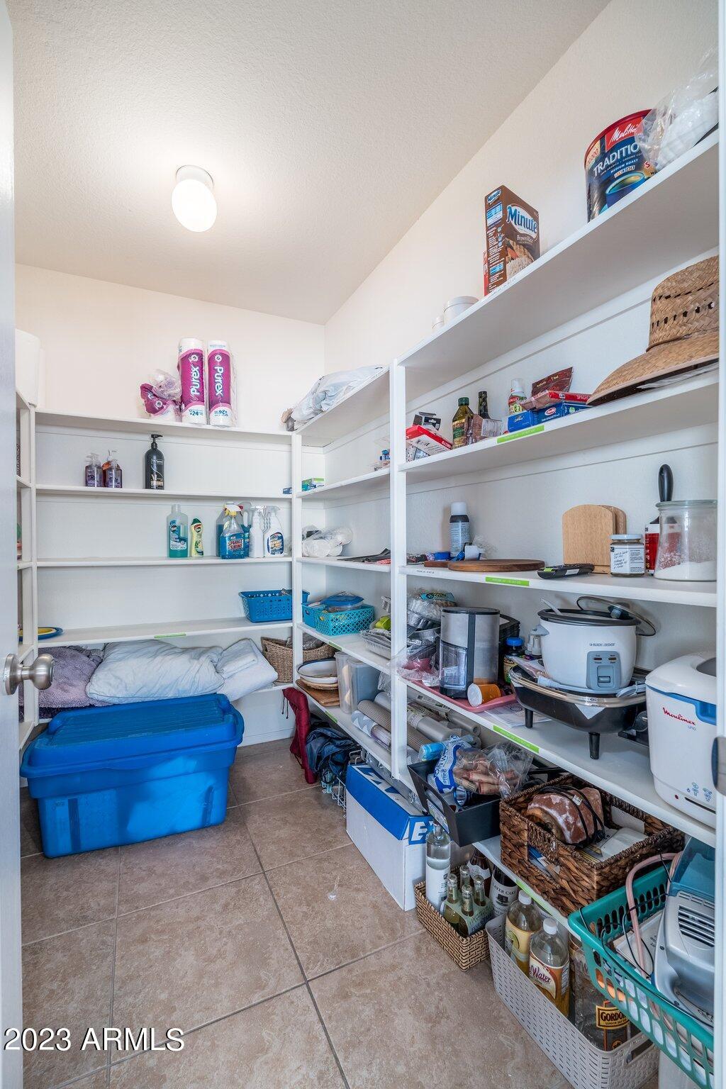 2215 West Peak View Road Phoenix, AZ 85085 - Photo 16 of 49 a kitchen with stainless steel appliances a lot of stuff