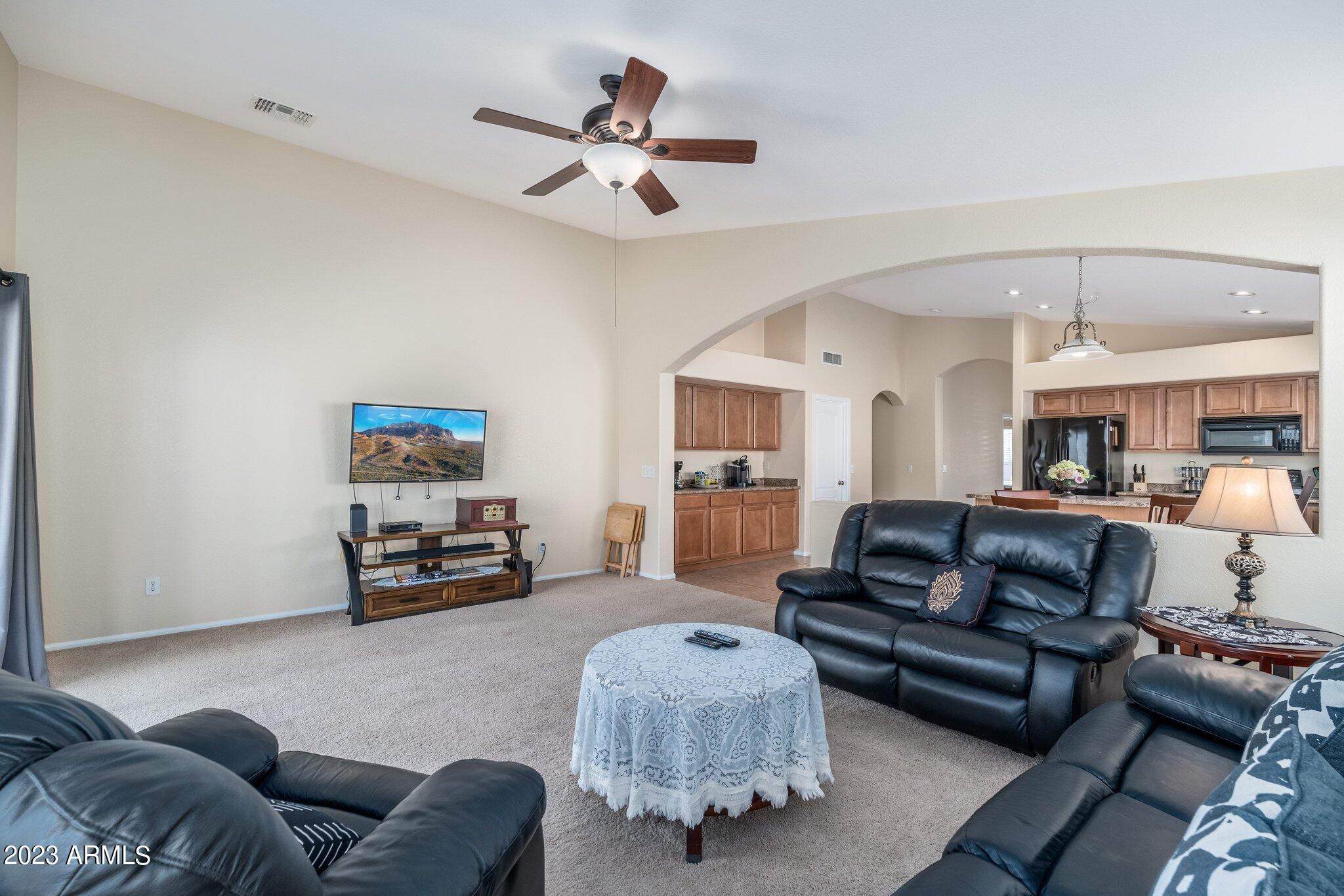 2215 West Peak View Road Phoenix, AZ 85085 - Photo 18 of 49 a living room with furniture