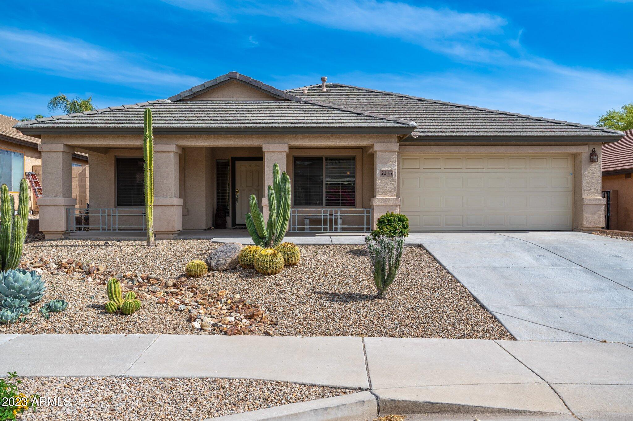 2215 West Peak View Road Phoenix, AZ 85085 - Photo 2 of 49 front view of a house
