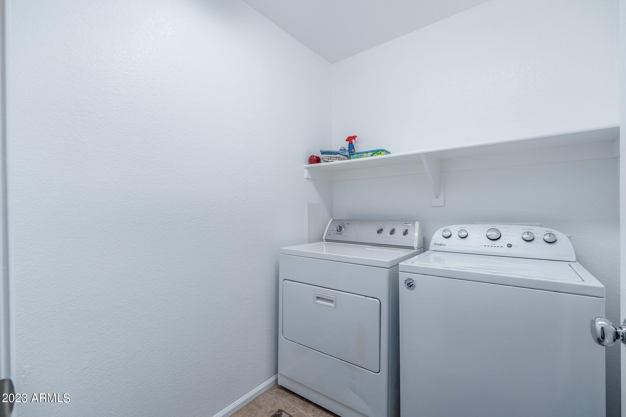 2215 West Peak View Road Phoenix, AZ 85085 - Photo 31 of 49 a utility room with dryer and washer