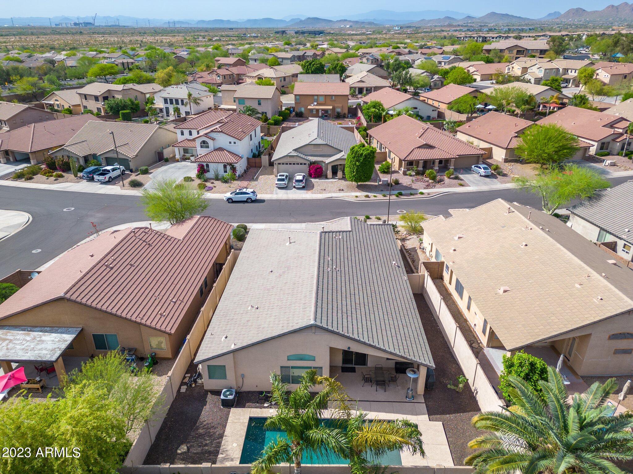 2215 West Peak View Road Phoenix, AZ 85085 - Photo 39 of 49 an aerial view of residential houses with outdoor space