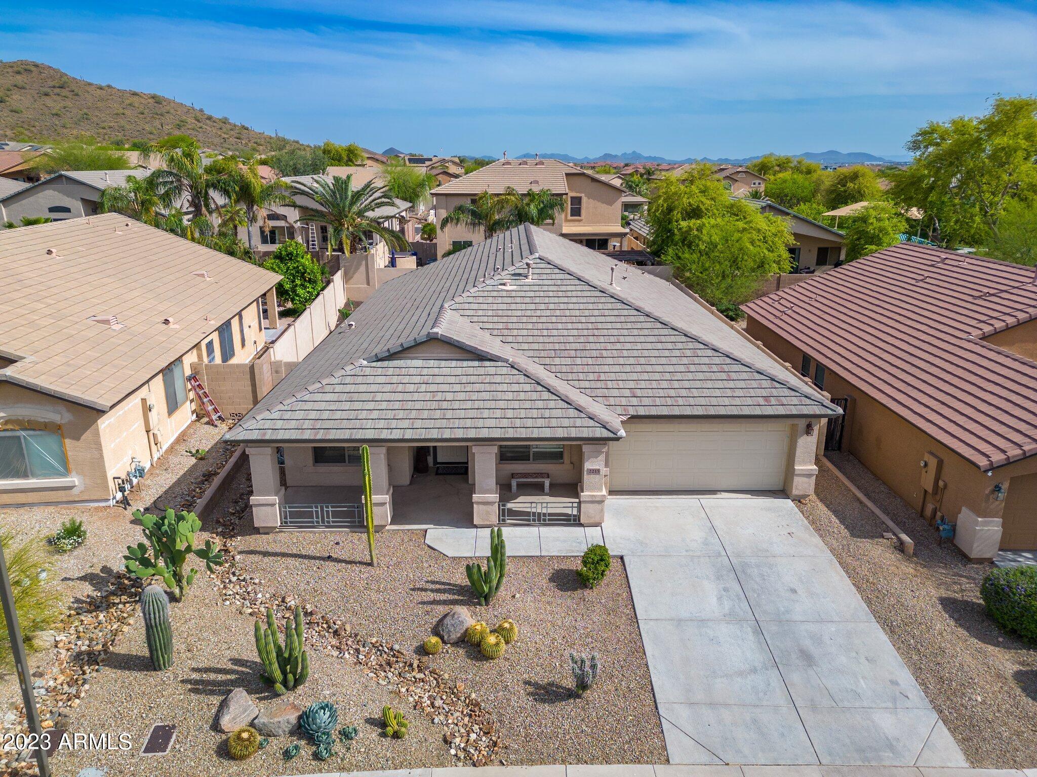 2215 West Peak View Road Phoenix, AZ 85085 - Photo 4 of 49 an aerial view of a house with a yard
