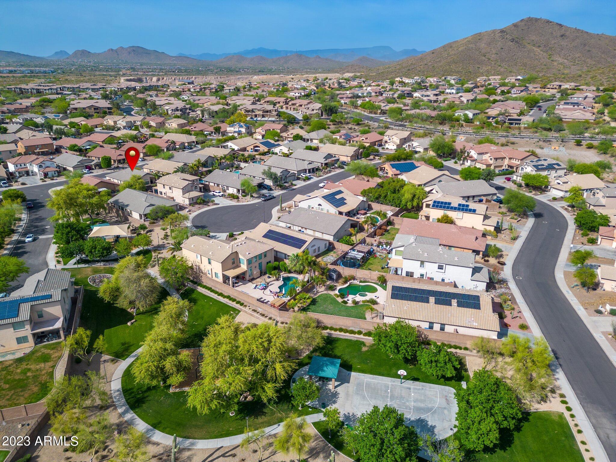 2215 West Peak View Road Phoenix, AZ 85085 - Photo 46 of 49 an aerial view of residential houses with outdoor space and trees