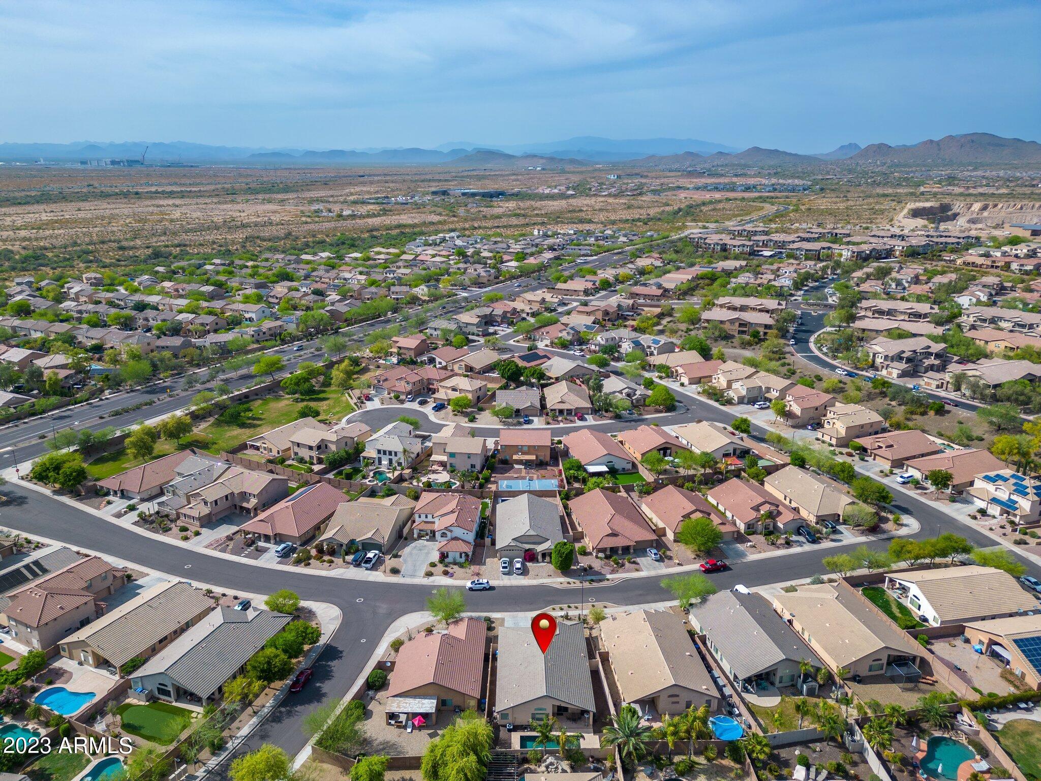 2215 West Peak View Road Phoenix, AZ 85085 - Photo 49 of 49 an aerial view of residential houses with outdoor space
