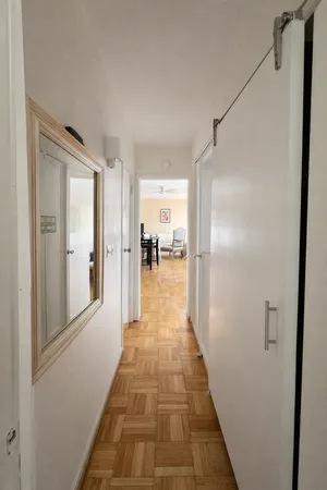 a bathroom with a glass door shower