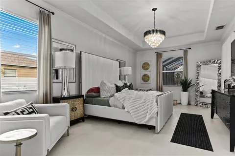 a kitchen with kitchen island stainless steel appliances a sink and a refrigerator