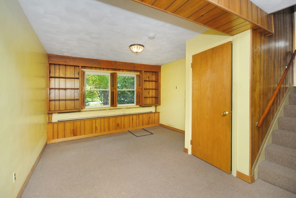13 Beverly Road Acton, MA 01720 - Photo 14 of 23 a view of an empty room with a window