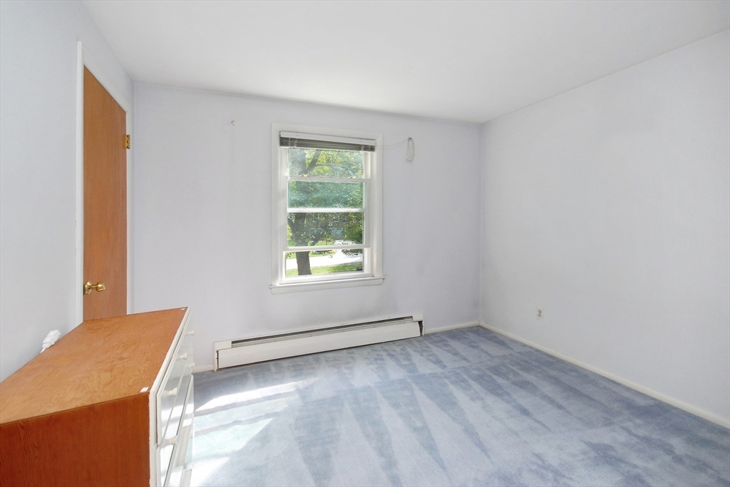 13 Beverly Road Acton, MA 01720 - Photo 16 of 23 an empty room with a window