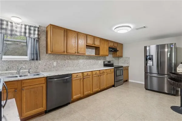 $725,000 | 2410 Henderson Road, Tucker, GA 30084