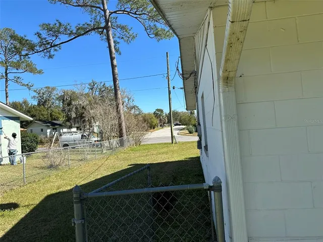 a view of a yard with an outdoor space