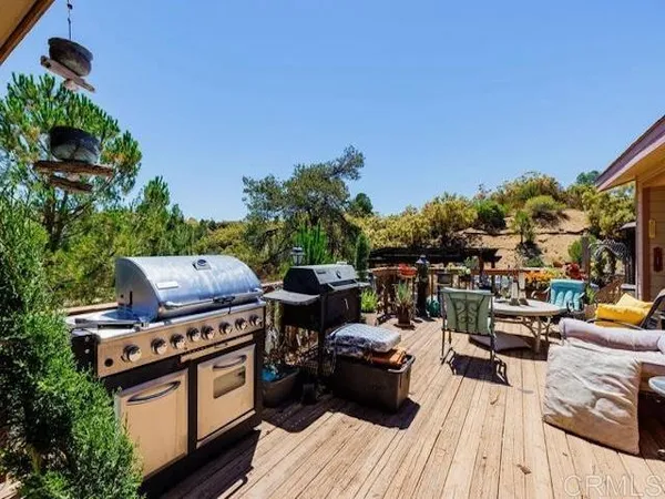 a view of a balcony with chairs