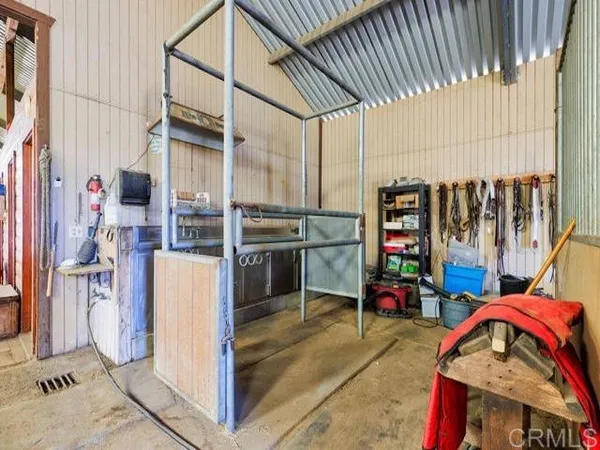 a view of walk in balcony with chairs