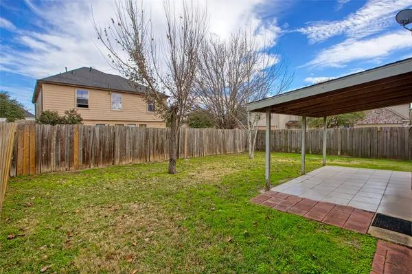 a view of a backyard with a garden