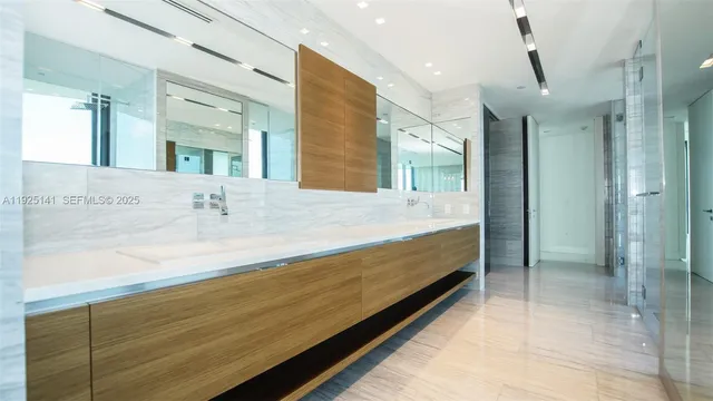 a bathroom with a bathtub and a sink