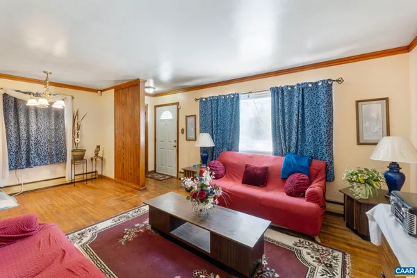 a living room with furniture and a couch