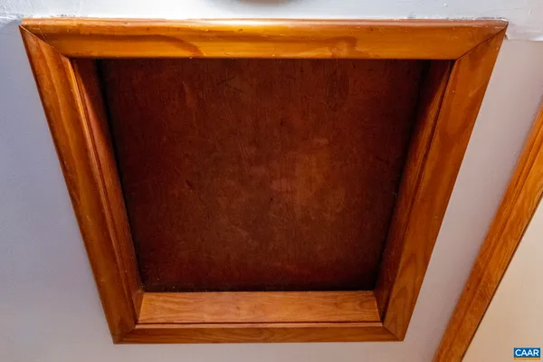 a room with furniture a washer and dryer
