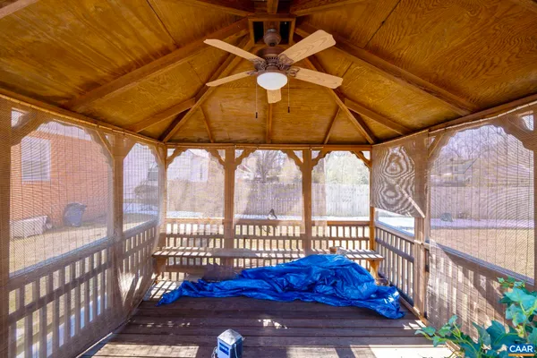 a view of balcony with wooden floor