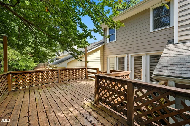 a balcony view with a seating space