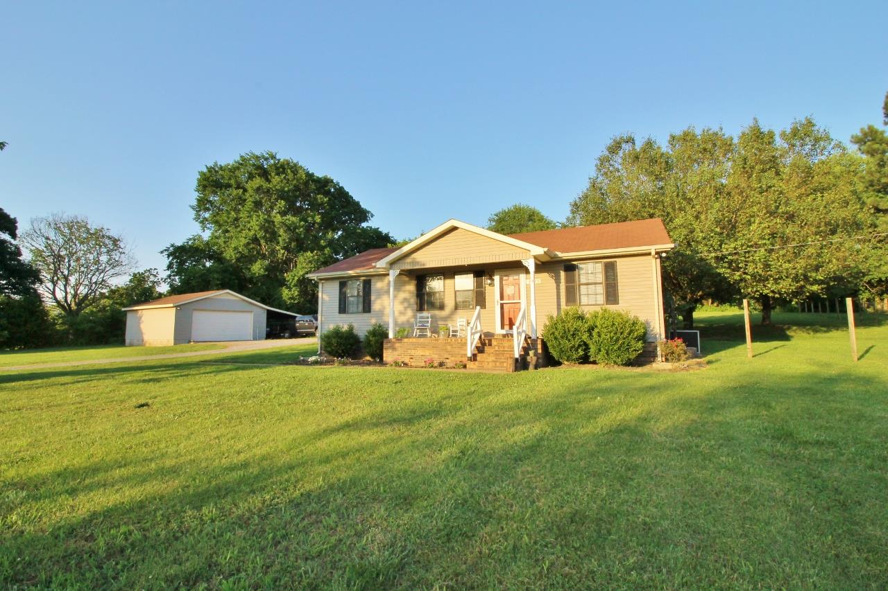 3975 Beasleys Bend Road Lebanon, TN 37087 - Photo 2 of 25 a front view of a house with a yard and trees