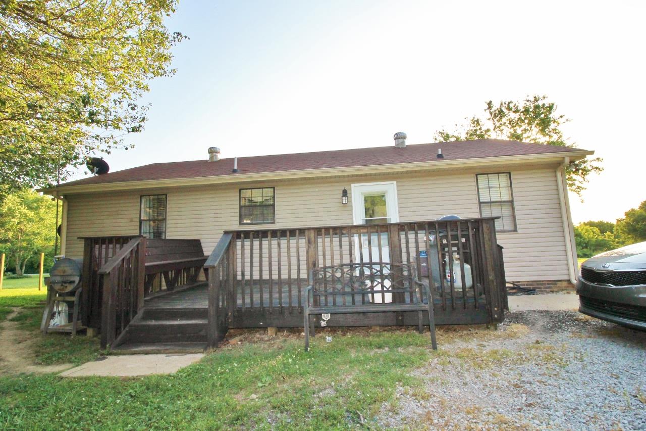 3975 Beasleys Bend Road Lebanon, TN 37087 - Photo 22 of 25 a view of house with a yard and deck