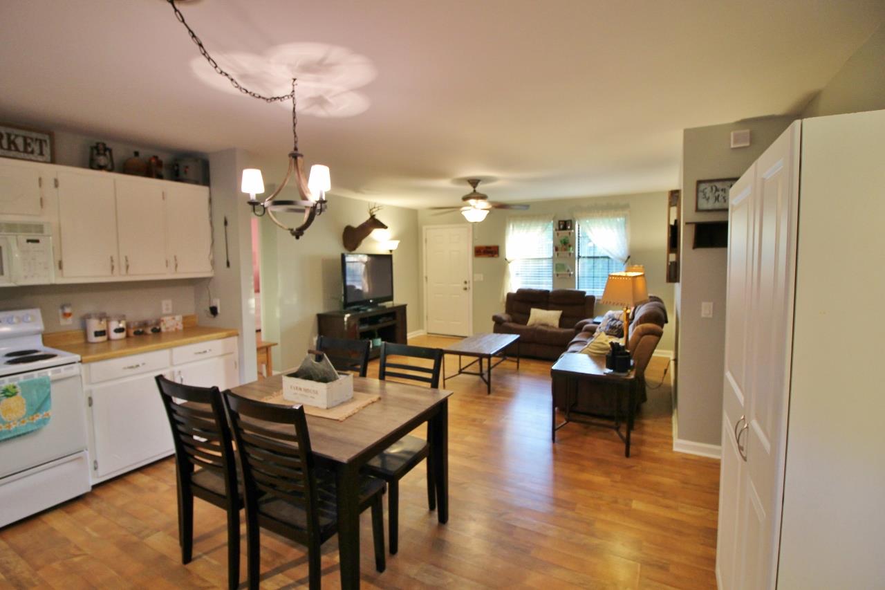 3975 Beasleys Bend Road Lebanon, TN 37087 - Photo 8 of 25 a large kitchen with a table and chairs
