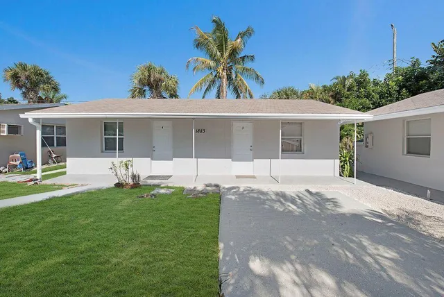 a front view of house with yard