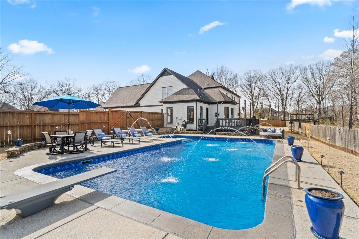 1804 Lisson Lane Collierville, TN 38017 - Photo 19 of 35 a view of a swimming pool with lounge chairs
