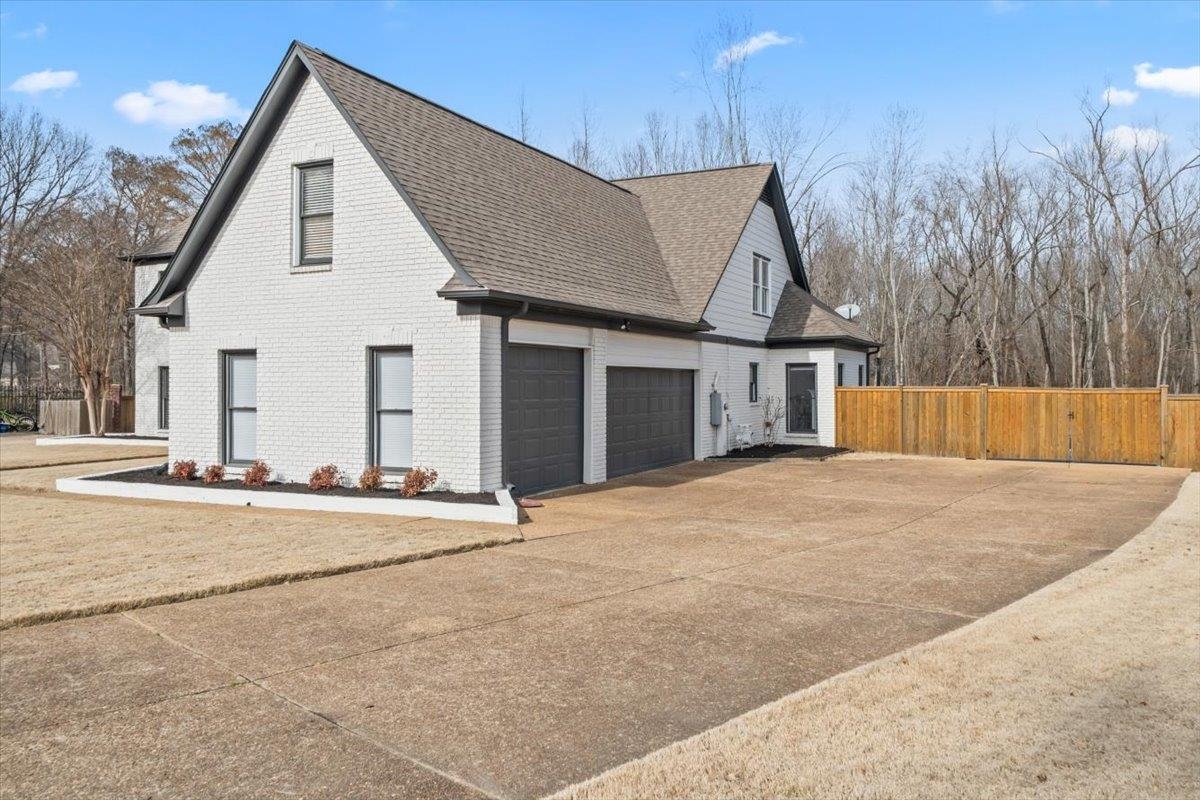 1804 Lisson Lane Collierville, TN 38017 - Photo 20 of 35 front view of a house with a yard and garage
