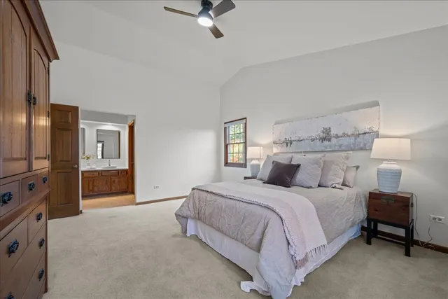 a bedroom with a bed and a television in it