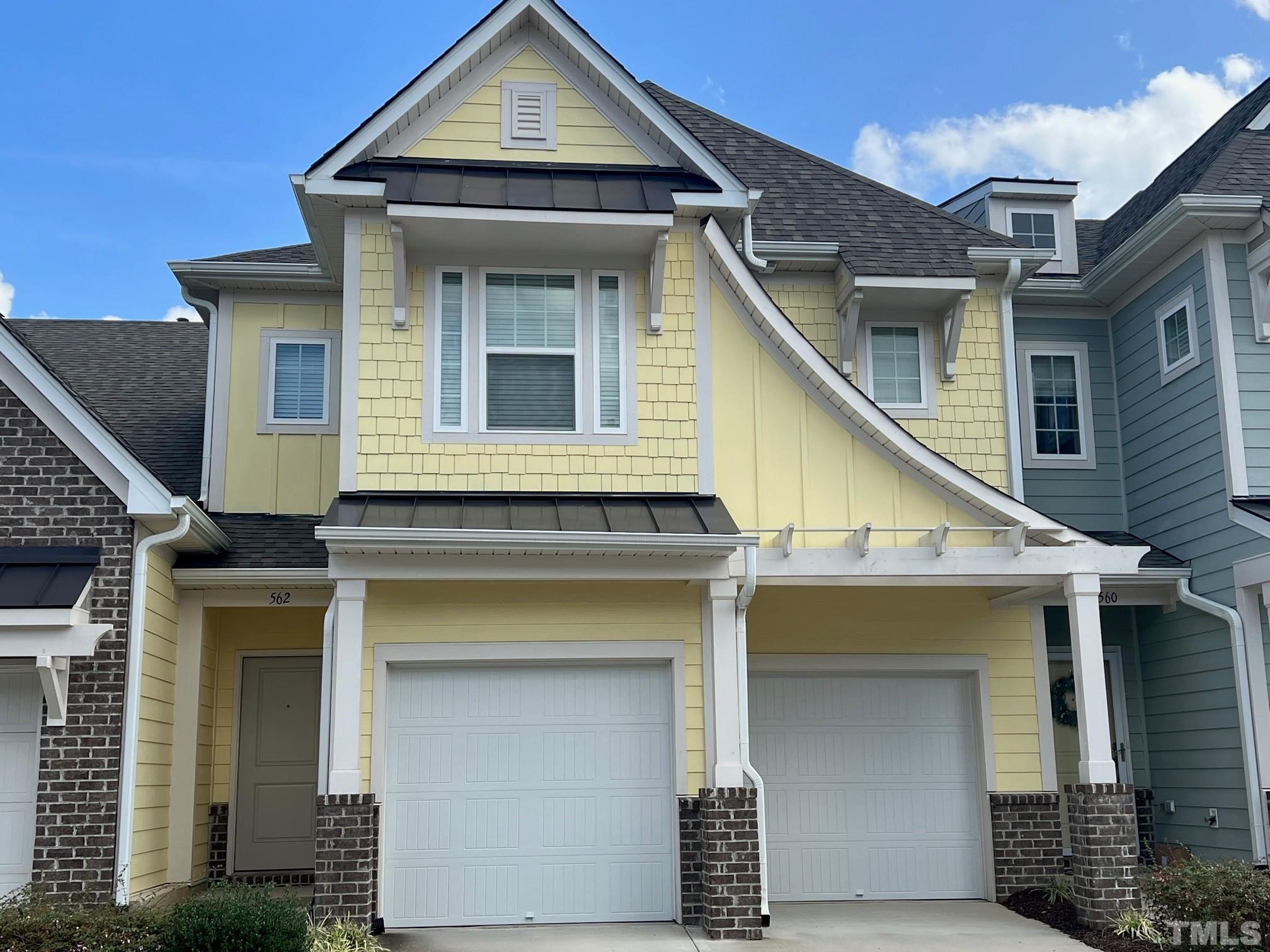 562 Metro Station Apex, NC 27502 - Photo 1 of 19 a front view of a house