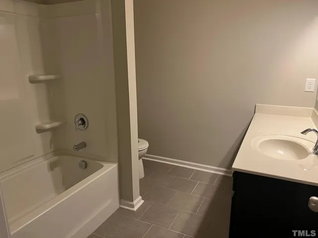 a bathroom with a sink and a bathtub