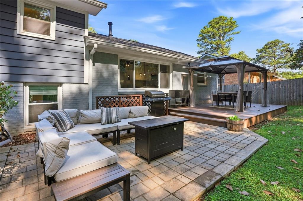 1430 Thomas Road Decatur, GA 30030 - Photo 33 of 42 a view of a patio with couches table and chairs and potted plants