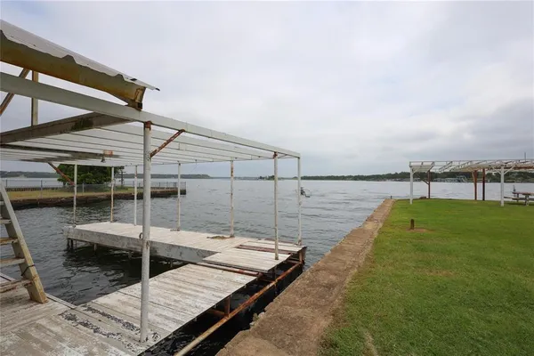a view of a swimming pool with a chair