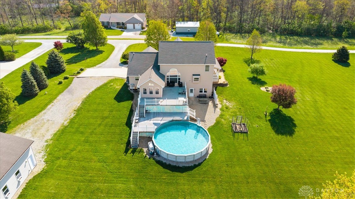 841 Willow Road Springfield, OH 45502 - Photo 52 of 64 This spacious property features a refreshing pool and expansive yard, perfect for outdoor living.