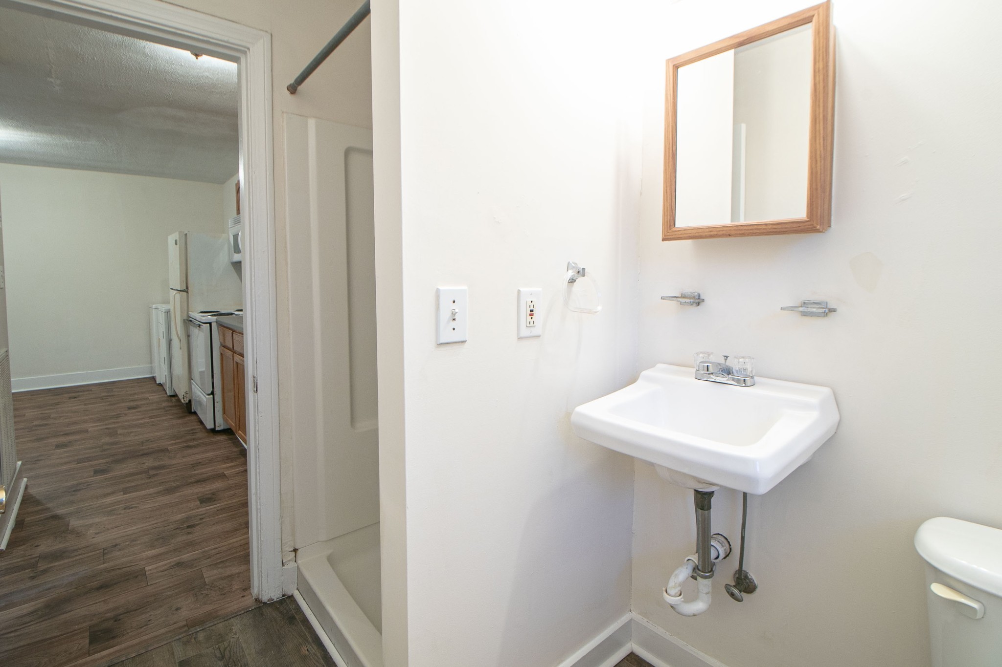 802 Robb Avenue, Unit B Clarksville, TN 37040 - Photo 15 of 15 a bathroom with a sink a mirror and a toilet