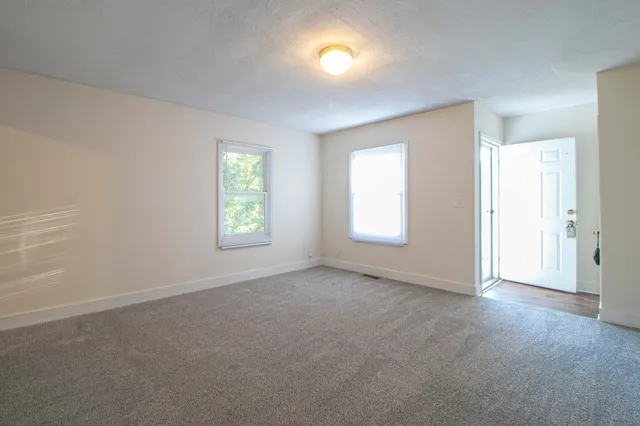 an empty room with windows